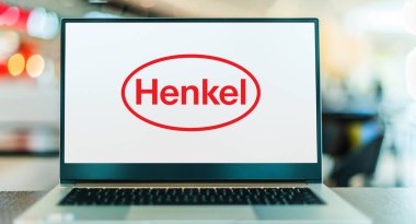 POZNAN, POL - DEC 28, 2022: Laptop computer displaying logo of Henkel, a chemical and consumer goods company headquartered in Duesseldorf, Germany