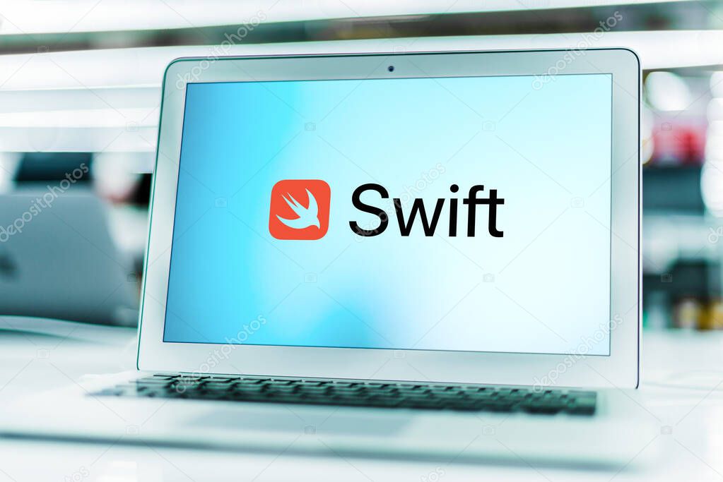 POZNAN, POL - MAR 15, 2021: Laptop computer displaying logo of Swift, a general-purpose, multi-paradigm, compiled programming language developed by Apple Inc. and the open-source community