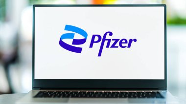 POZNAN, POL - OCT 28, 2022: Laptop computer displaying logo of Pfizer, a multinational pharmaceutical and biotechnology corporation headquartered in New York City, USA