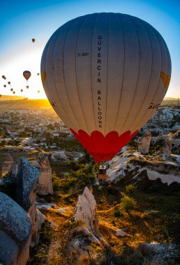 GOREME, TUR - OCT 14, 2023: Hot air balloon in Goreme National Park in Cappadocia, Turkey. clipart