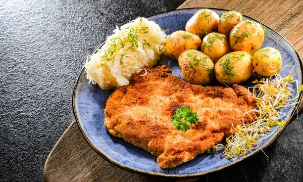 Pork Breaded Cutlet Coated Breadcrumbs Served Potatoes Cabbage — Stockfoto