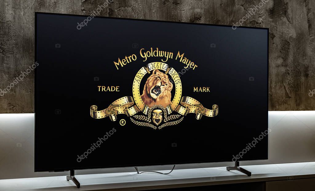 POZNAN, POL - DEC 19, 2023: Flat-screen TV set displaying logo of Metro-Goldwyn-Mayer Studios, a media company, involved in the production and distribution of feature films and television programs