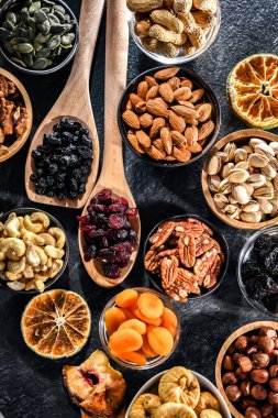 Composition with a variety of dried fruits and assorted nuts. Delicacies.