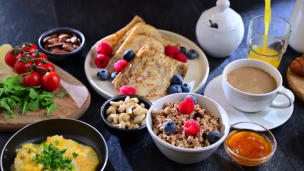 Breakfast Served Coffee Orange Juice Scrambled Eggs Cereals Pancakes Croissants — Stok video