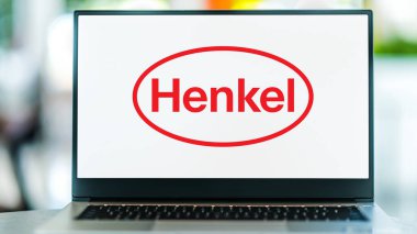 POZNAN, POL - DEC 28, 2022: Laptop computer displaying logo of Henkel, a chemical and consumer goods company headquartered in Duesseldorf, Germany