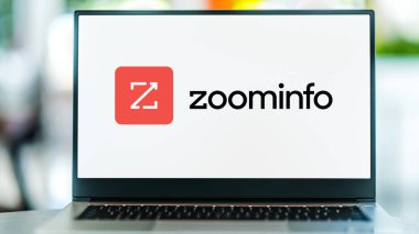 POZNAN, POL - DEC 28, 2022: Laptop computer displaying logo of  ZoomInfo Technologies, a software and data company which provides information and data for companies and business individuals