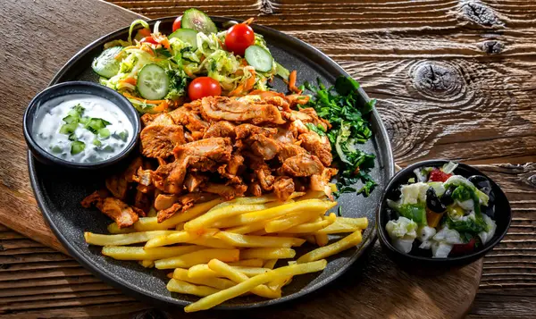 Kebab Served French Fries Vegetable Salad Tzatziki — Stock Fotó