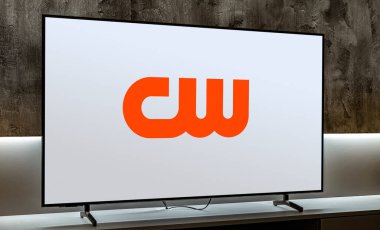 POZNAN, POL - MAR 01, 2024: Flat-screen TV set displaying logo of The CW Television Network, an American English-language free-to-air television network, operated by The CW Network, LLC clipart