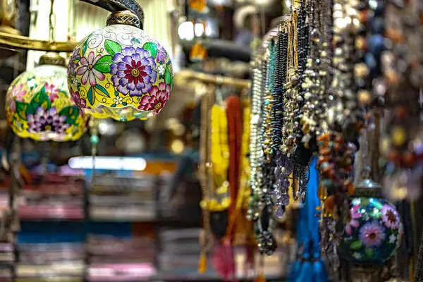 stock image MUSCAT, OMAN - MAR 19, 2024: Interior of a store with traditional handicraft products on Souq Muttrah, Muscat, Oman