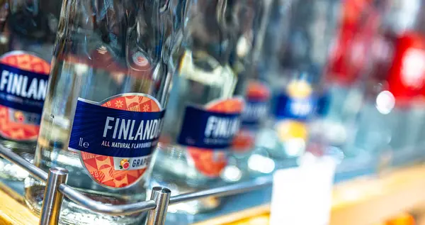 stock image DUBAI, UAE - MAR 22, 2022: Bottles of Finlandia Grapefruit vodka on a store shelf