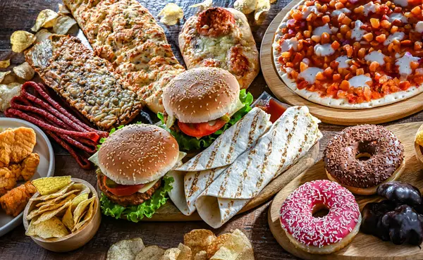 Żywność Zwiększająca Ryzyko Raka Jedzenie Śmieciowe Obrazy Stockowe bez tantiem