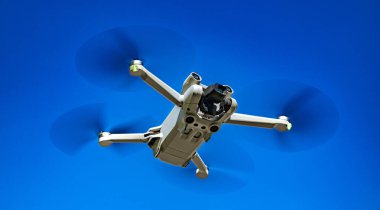 Small drone during flight clipart