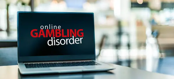 stock image Laptop computer displaying the sign of online gambling disorder