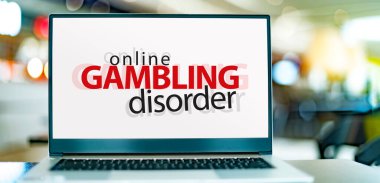 Laptop computer displaying the sign of online gambling disorder clipart