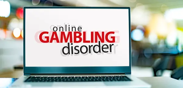 stock image Laptop computer displaying the sign of online gambling disorder