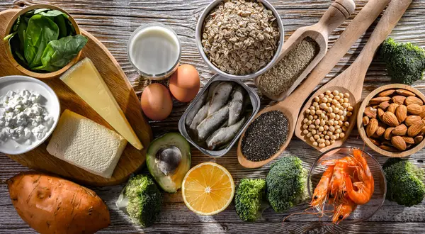 stock image Composition with food products rich in calcium.