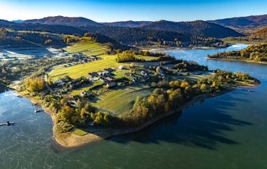 Aerial view of Lake Solina near the village of Zawoz in Bieszczady Mountains, Poland clipart