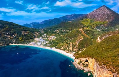 Panoramic view of the beach in Lichnos, near Parga in the region of Preveza in Epirus, Greece. clipart