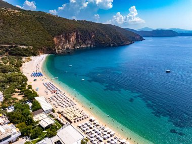 Panoramic view of the beach in Lichnos, near Parga in the region of Preveza in Epirus, Greece. clipart