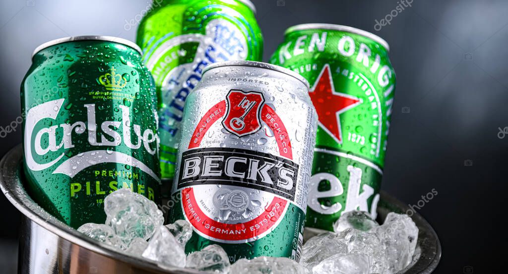POZNAN, POL - APR 04, 2025: Cans of popular global beer brands: Carlsberg, Heineken, Becks and Tuborg