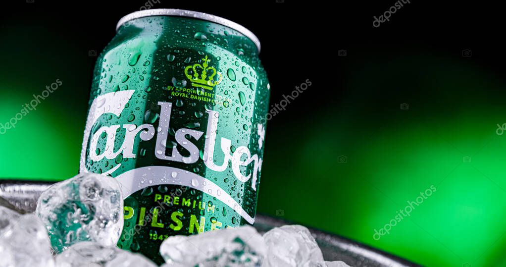POZNAN, POL - APR 04, 2025: Can of Carlsberg beer in bucket with ice