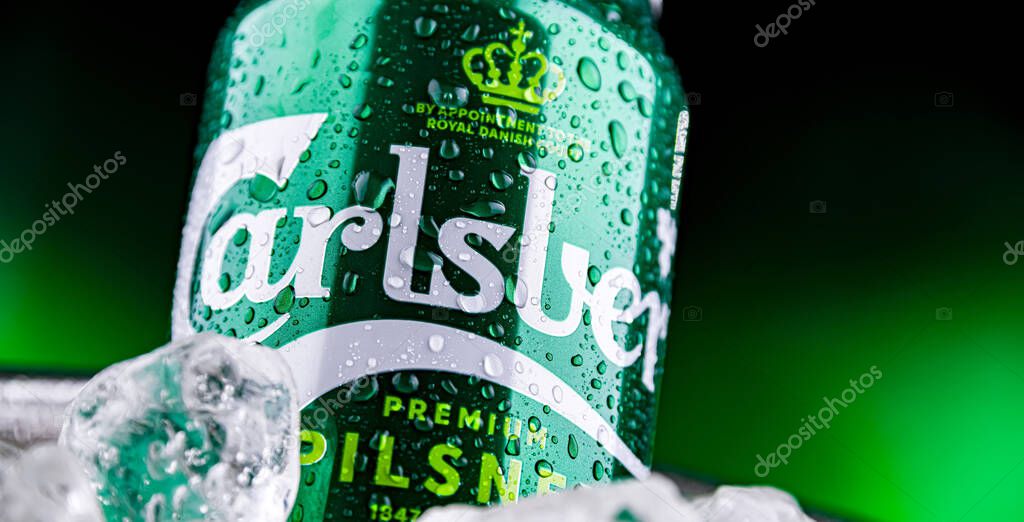 POZNAN, POL - APR 04, 2025: Can of Carlsberg beer in bucket with ice