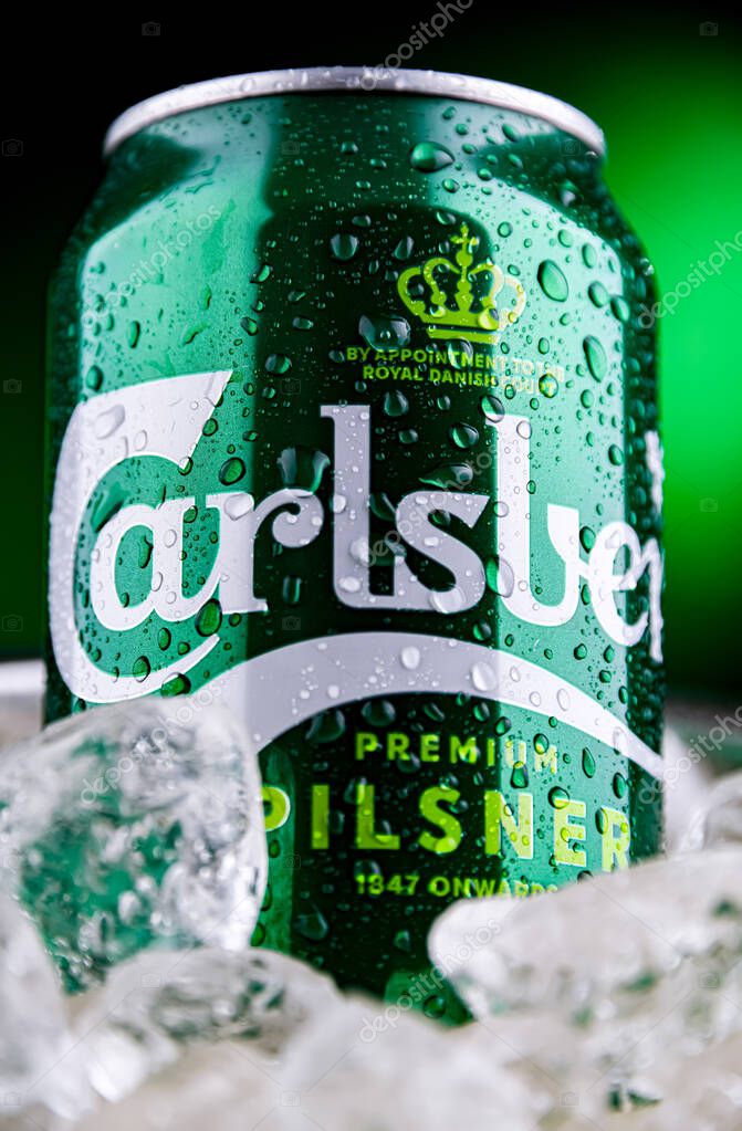 POZNAN, POL - APR 04, 2025: Can of Carlsberg beer in bucket with ice