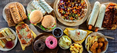 Yiyecekler kanser riskini arttırıyor. Abur cubur.