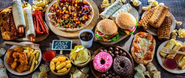 Yiyecekler kanser riskini arttırıyor. Abur cubur.