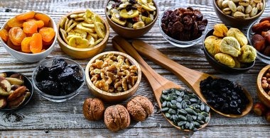 Composition with a variety of dried fruits and assorted nuts. Delicacies.