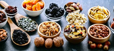 Composition with a variety of dried fruits and assorted nuts. Delicacies.