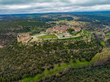 Medieval walled city of Pedraza in Segovia general panoramic aerial view east clipart