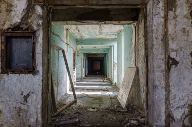 Scary corridor in an abandoned building.