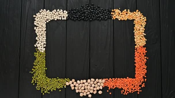 Variety Legumes Black Wooden Background Form Frame — Vídeo de Stock