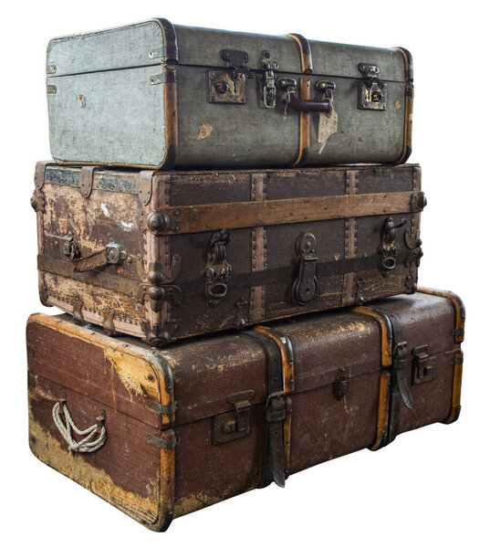 Stack of old suitcases isolated on white background