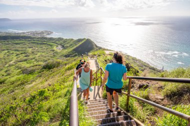 Honolulu, Hawaii - December 27, 2022:  Tourists hiking down the Diamond Head lookout trail.