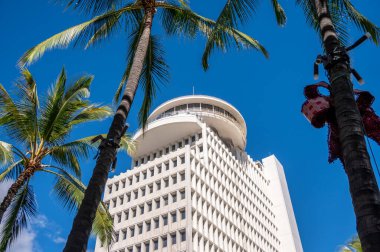 Honolulu, Hawaii - December 30, 2022: Looking up at the Waikiki Galleria Tower on Kalakaua Ave.
