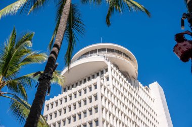 Honolulu, Hawaii - December 30, 2022: Looking up at the Waikiki Galleria Tower on Kalakaua Ave.