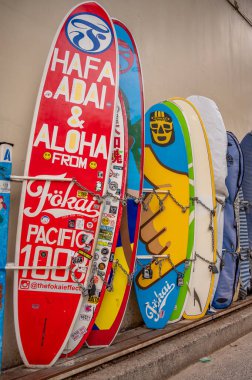 Honolulu, Hawaii - January 1, 2023: Surfboards lined up in storage at Waikiki.