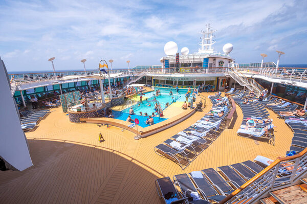 Cozumel, Mexico - April 5, 2023: View of the pool deck on the Radiance of the Seas cruise ship near Mexico.