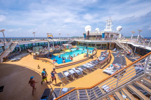 stock image Cozumel, Mexico - April 5, 2023: View of the pool deck on the Radiance of the Seas cruise ship near Mexico.