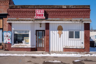 Nanton, Alberta - March 30, 2024: AJ's DIner in downtown Granum. clipart
