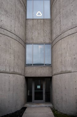 Calgary, Alberta - May 4, 2024: Architectural detial of the old brutalist science centre. Now host a contemporary art gallery. clipart