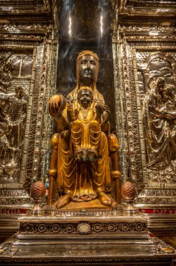 Montserrat, Spain - August 3, 2024: Black Madonna at the basilica at Montserrat monastery in Spain near Barcelona. clipart