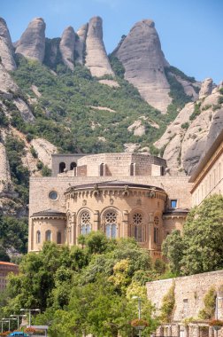 Montserrat, Spain - August 3, 2024: Historic monastery of Montserrat in Spain near Barcelona. clipart