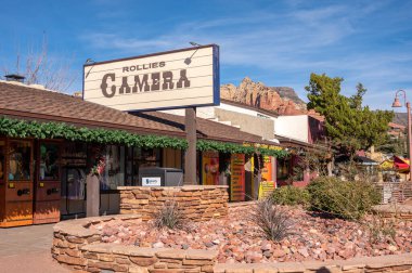 Sedona, United States - December 27, 2024: Busy Main Street in Sedona, Arizona. Rollies Camera visible. clipart