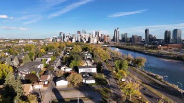  Aerial view of Calgary's downtown from along the Bow River on the west side of downtown looking east close to Memorial Drive.