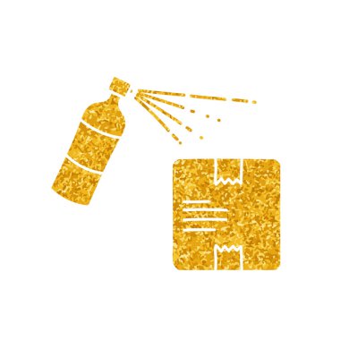 Paket ve dezenfektan sprey altın renginde.