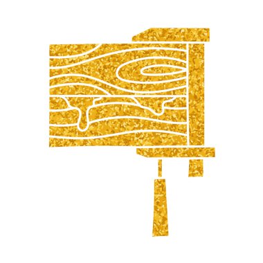 İki ahşap kırıntısı, klemp ile tutturulmuş ve altın rengi çizilmiş.