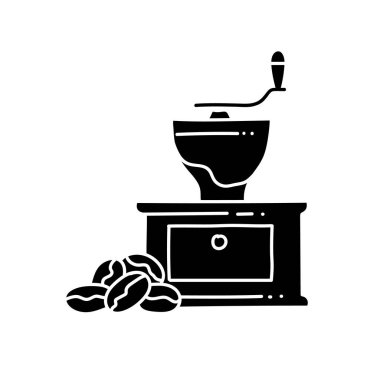 Kahve çekirdeği ve öğütücü, siyah el resmi.